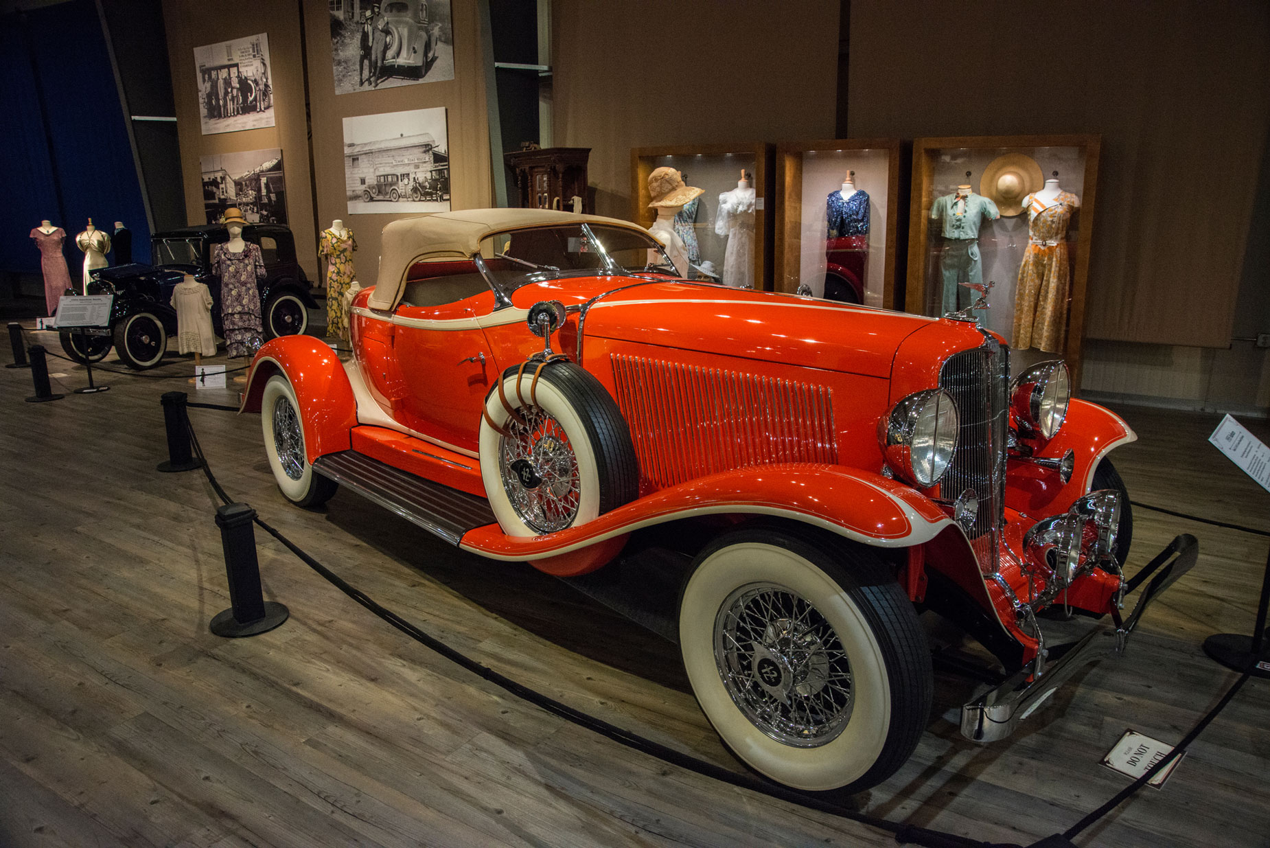 A red antique car at the Antique Auto Museum