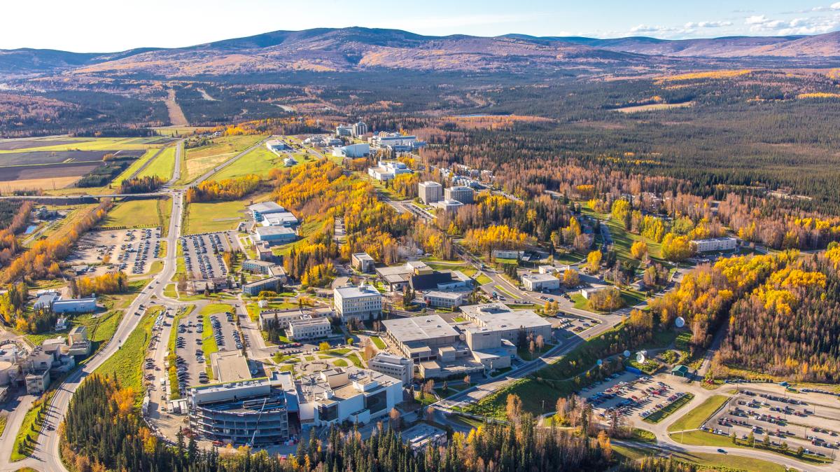 An aerial view of UAF campus and the surrounding area in autumn