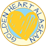 Portrait of person smiling in front of evergreen trees